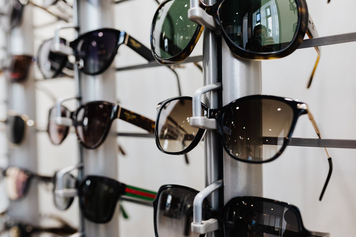 Close view of a tortoiseshell acetate eyeglass frame and its hinge